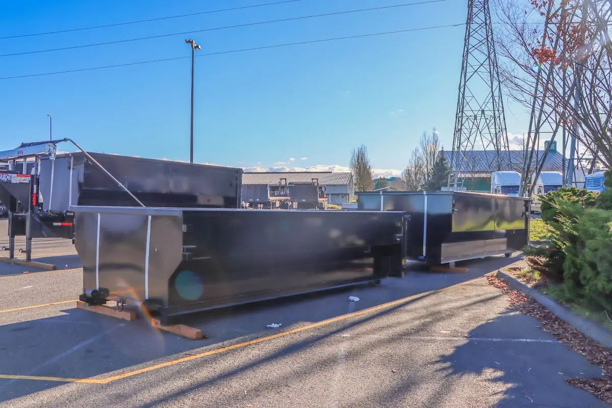 Roll-off dumpster ready for waste disposal at job site for Commercial Dumpster Rental in Franklin